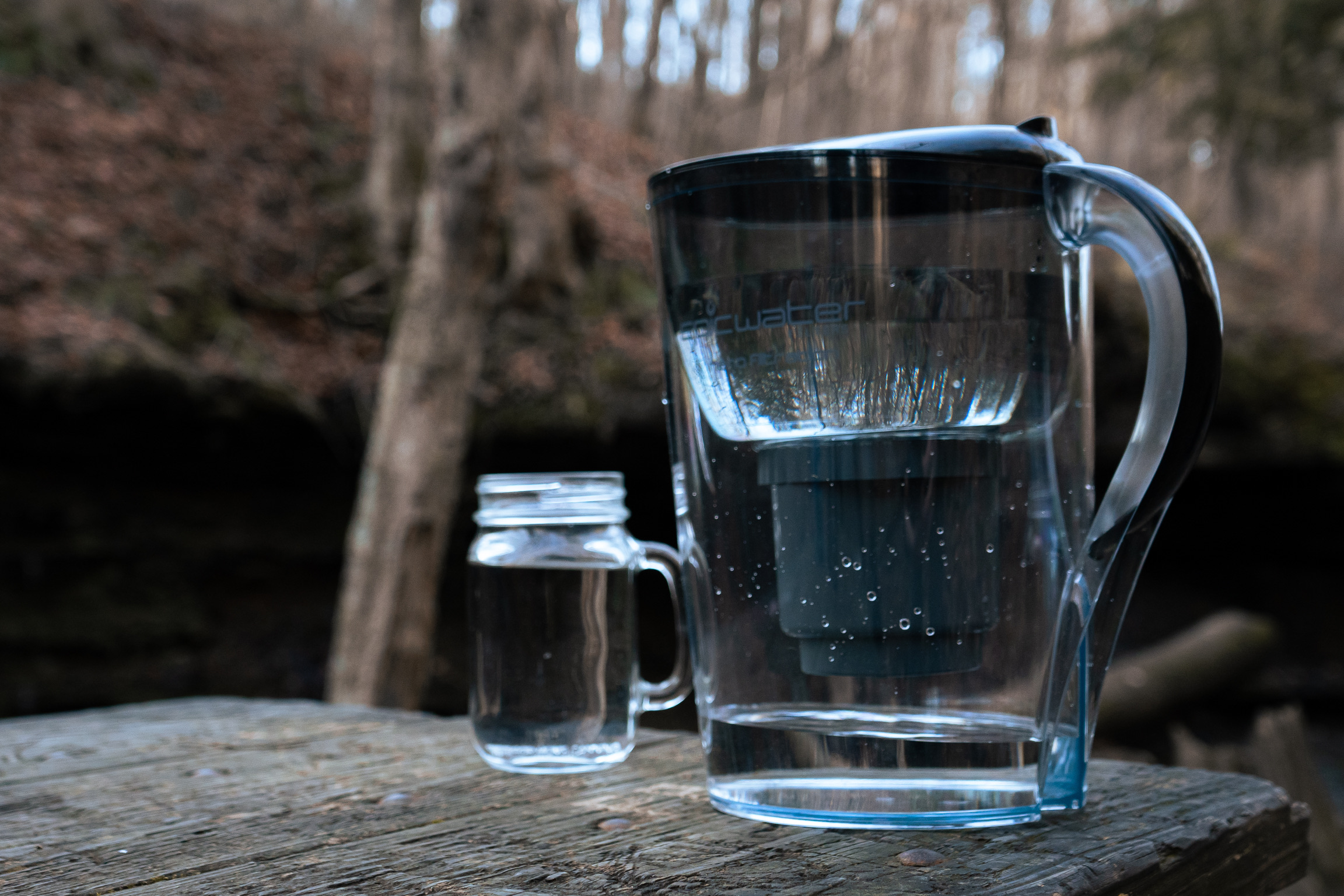 Glass of drinking water on a table, room temperature versus cold water