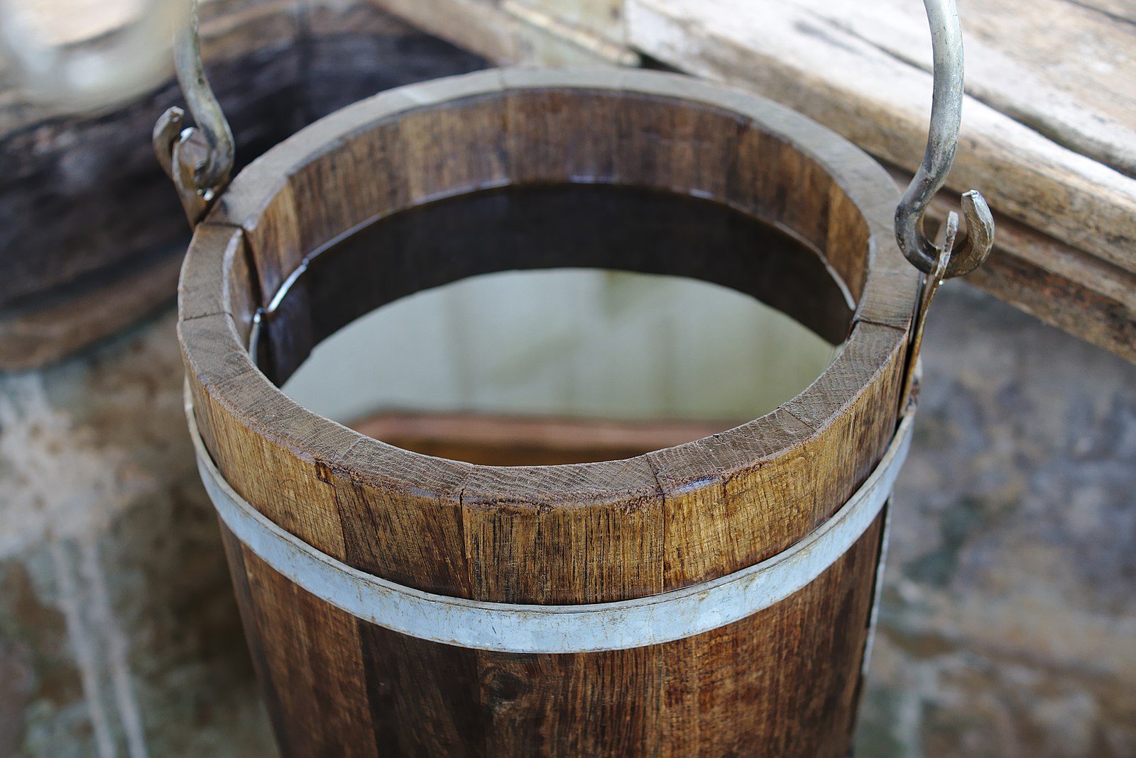 Water filter pitcher used for well water in a home kitchen